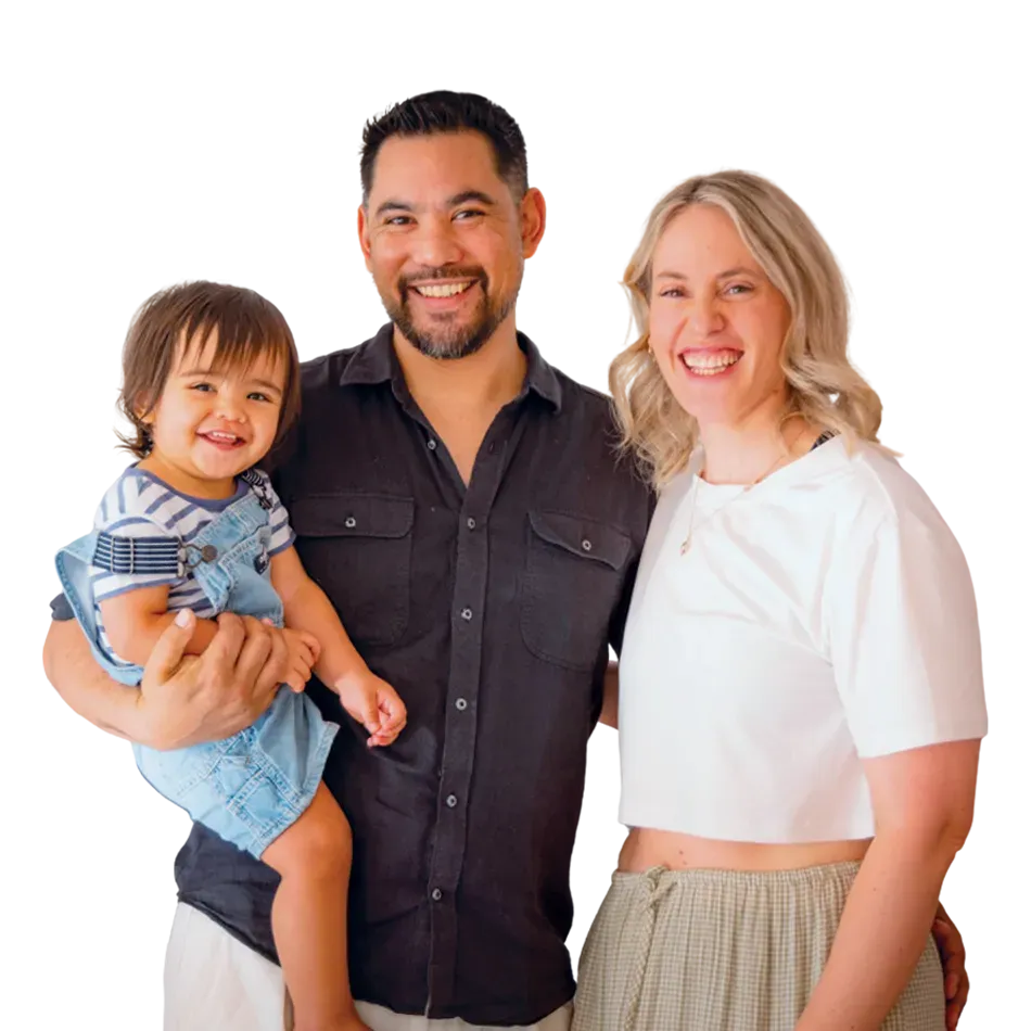 Happy parents holding their son