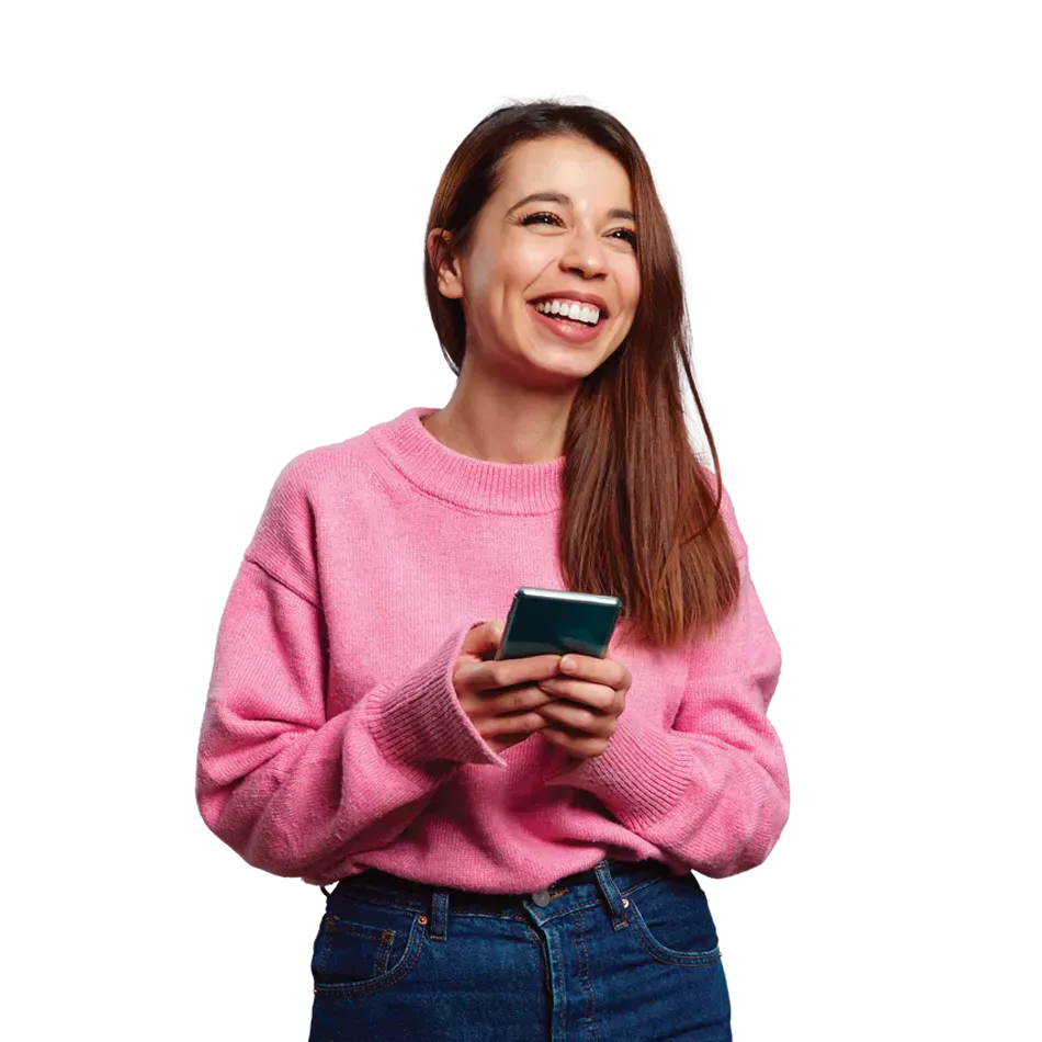 Happy young woman in a pink sweater