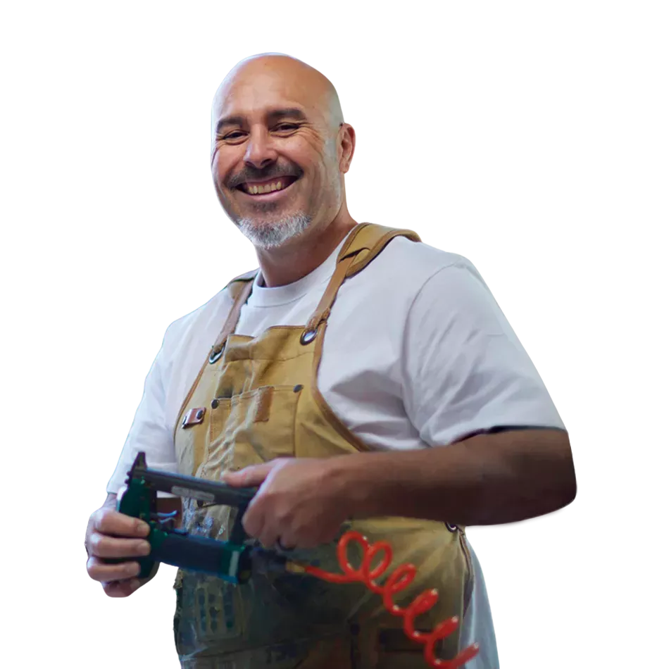 Man at work making picture frames