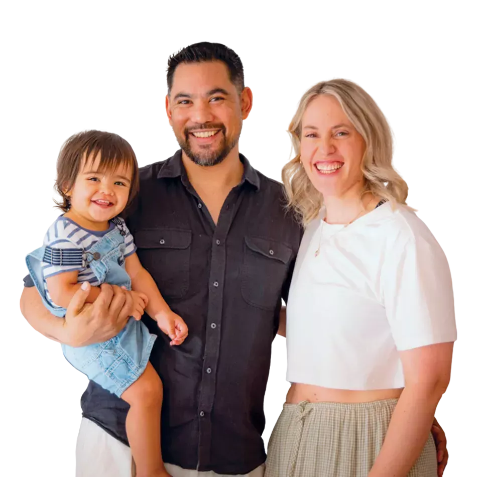Happy parents holding their son