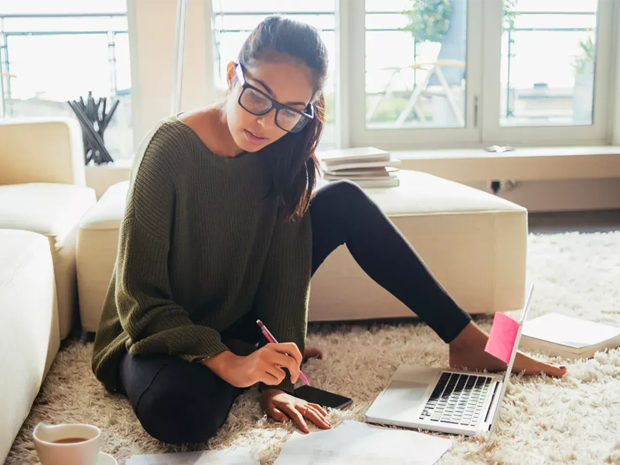 Young woman working on her finances