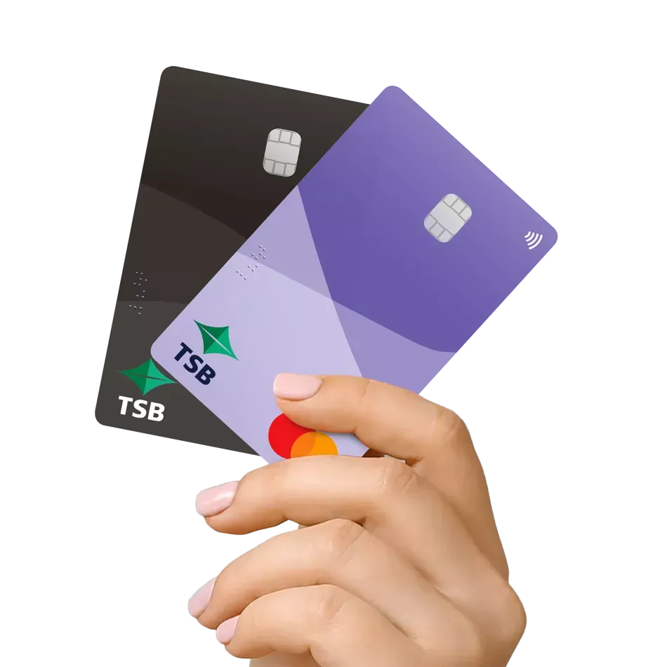 hand holding up TSB Low Rate and Platinum Credit Mastercards