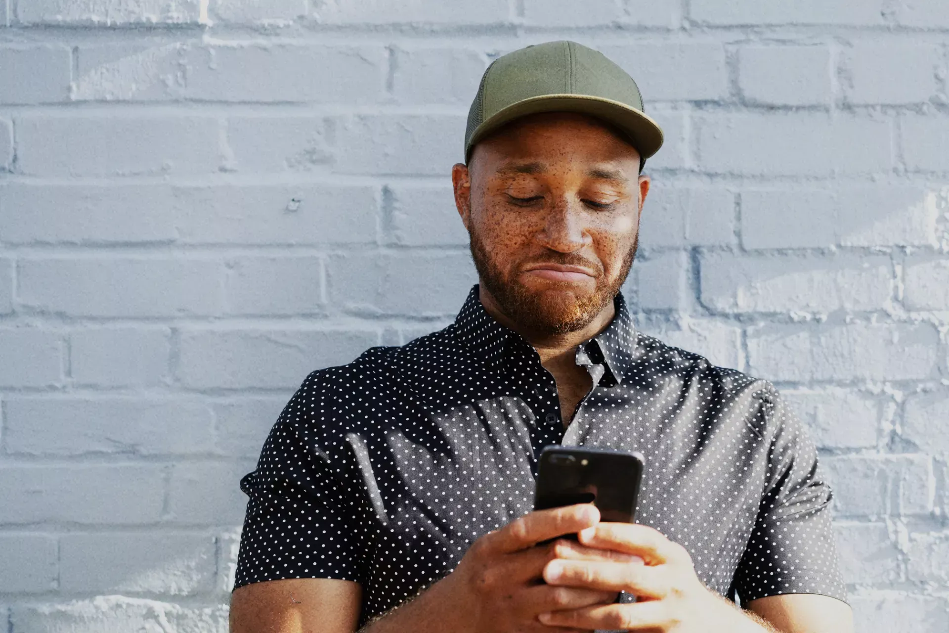 Person using a smartphone to look at TSB's award winning credit cards 