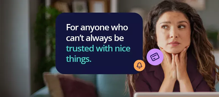woman sitting at her laptop with head in her hands thinking
