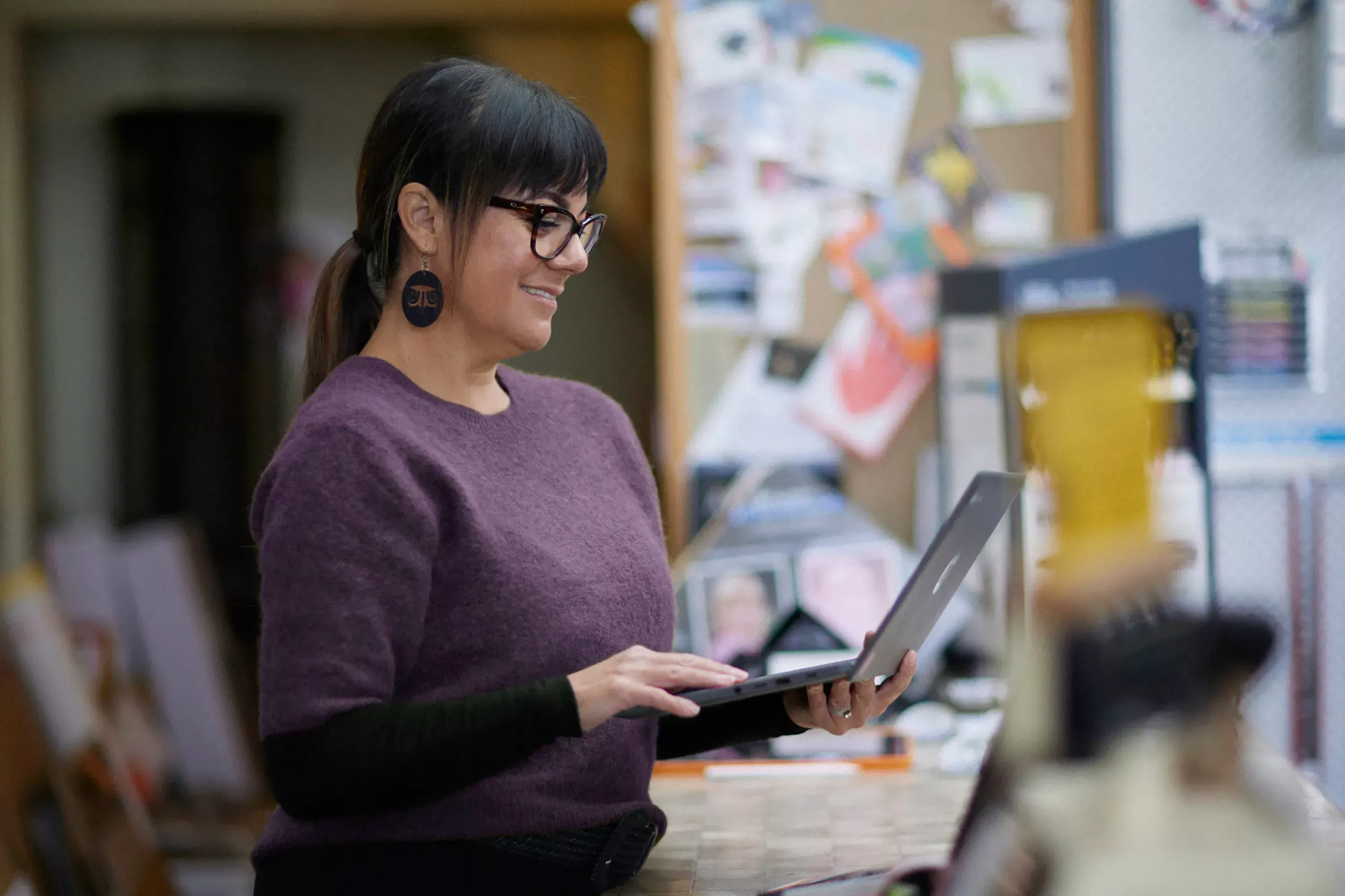 Business owner using a laptop to manage finances